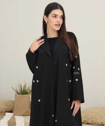 model with some 173cm wearing 56 size coat abaya