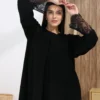 model wearing layered net abaya handcrafted in Dubai
