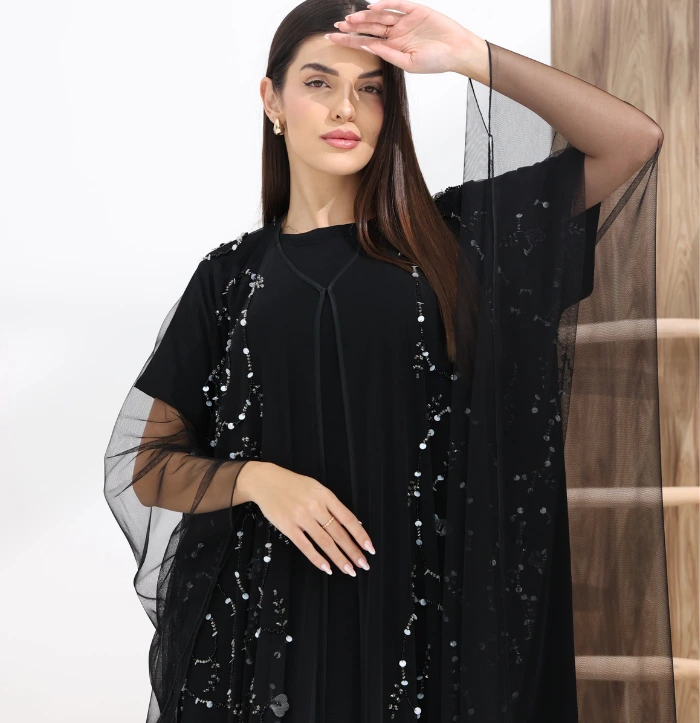 model wearing embellished abaya